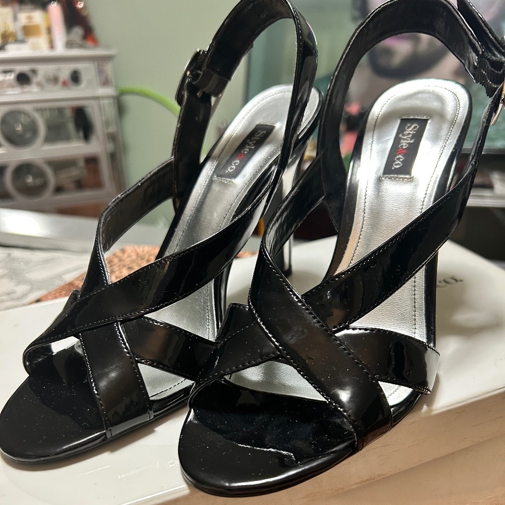Black Patent Leather shoe with a Chrome heel